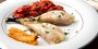 Recette gourmande Queues de Lotte rôties aux gousses d'ail et au beurre citronné